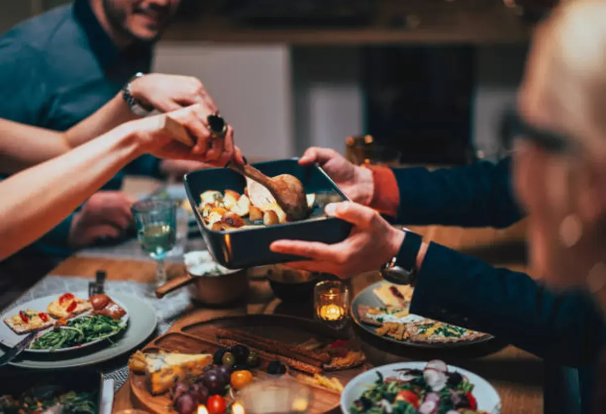 Sharing food as a gesture of connection and care.