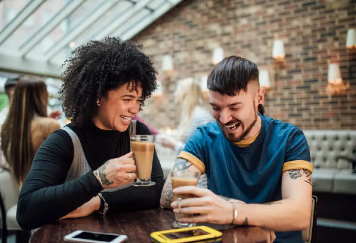 People connecting authentically, enjoying a moment unfiltered by digital distraction