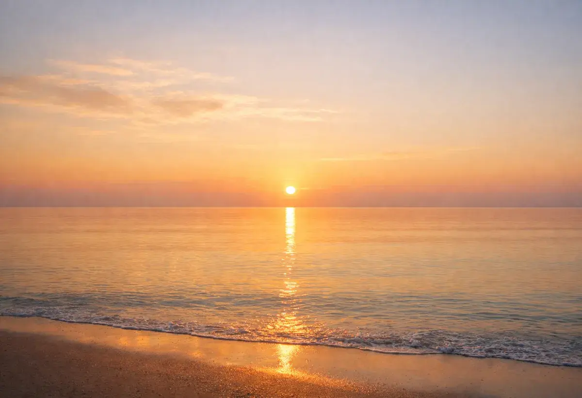 Sunrise over a calm horizon symbolizing emotional renewal and new beginning