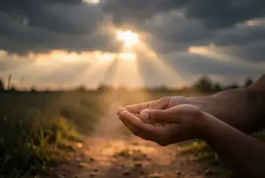 A single ray of sunlight breaking through dark clouds onto an open path, symbolizing hope, divine restoration, and life returning to what seemed lost