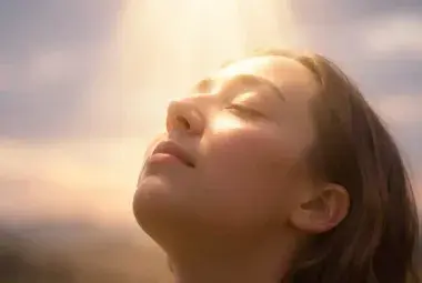 Upturned Face in Divine Light: A Moment of Surrender and Spiritual Filling