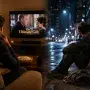 Man watching The Ultimate Gift while remembering his time living on the streets